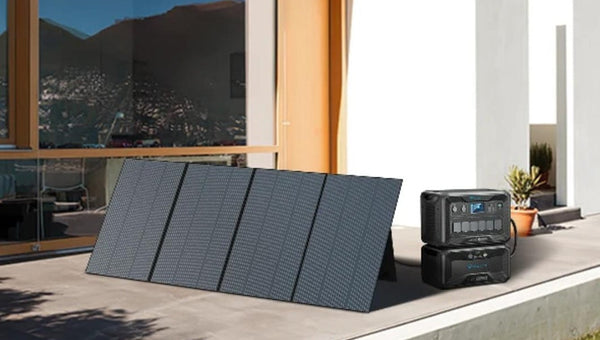 BLUETTI solar panels with power station in home garden